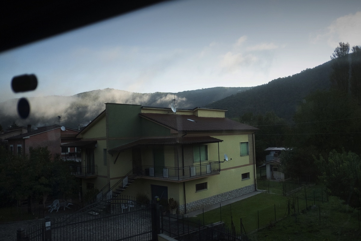 Rieti, Oct 2020: The view of a rural house during Ilias's bus journey to Rieti, where he goes to get his residence permit renewal from the municipality.
